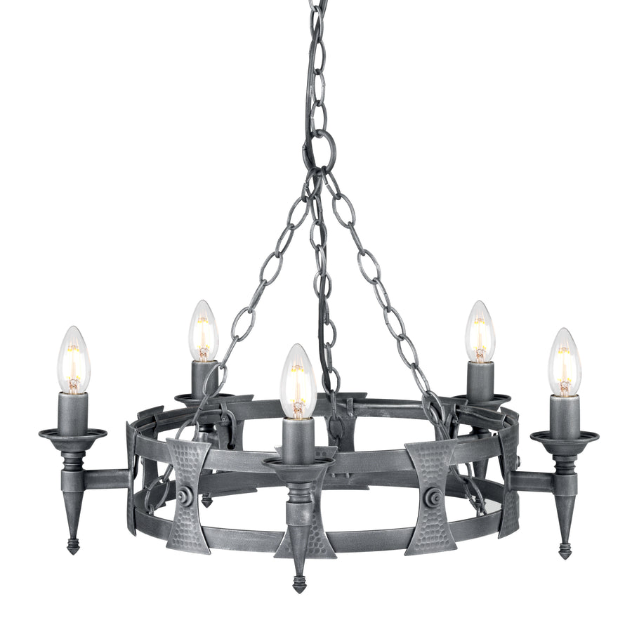 This Elstead Saxon black and silver wrought iron 5 light cartwheel chandelier has two metal bands for the cartwheel rim, decorated with hand-crafted beaten shields. Each of the five torchière light arms is mounted on a shield and features tapered finials and forged metal candle pans. It is all suspended from three chains attached to a central chain hanging from a circular ceiling mount