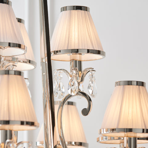 Oksana traditional 21 light candle chandelier with white pleated white shades and crystal droplets from Interiors 1900 